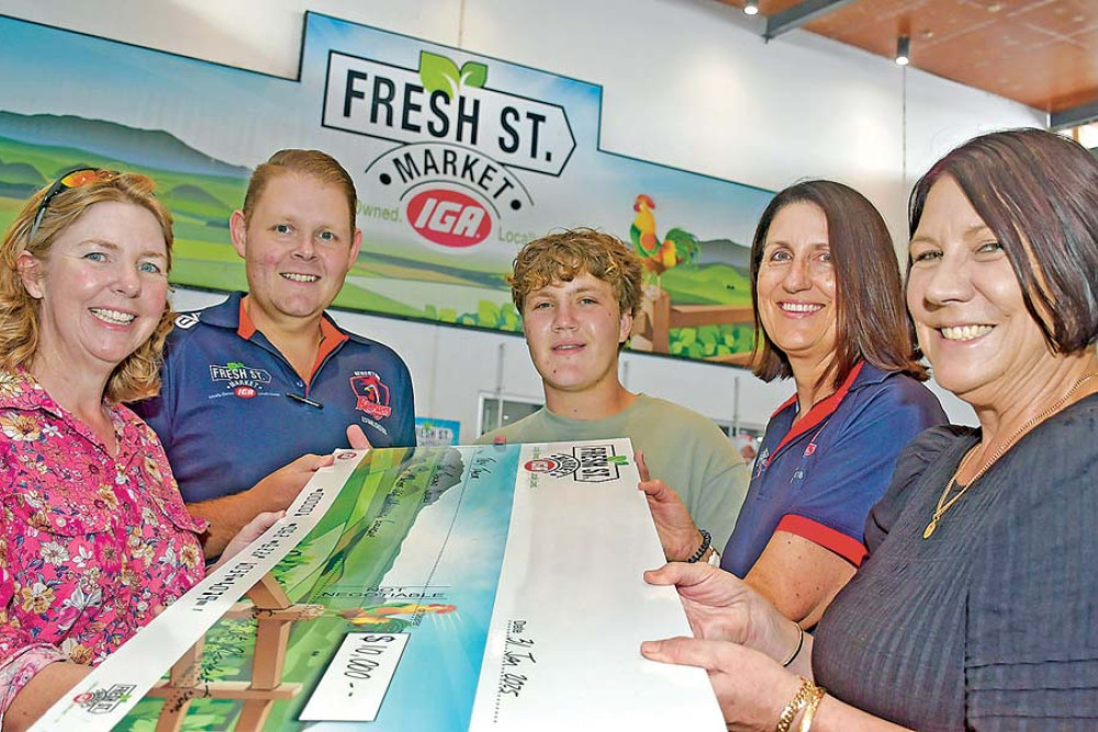 P&C treasurer Nicky Keevers (left), Fresh St Market IGA manager Matt Bowles, scholarship recipient Troy Taylor, Fresh St Market IGA office manger Sophie Irvine, and Atherton State High School principal Leanne Knight-Smith.