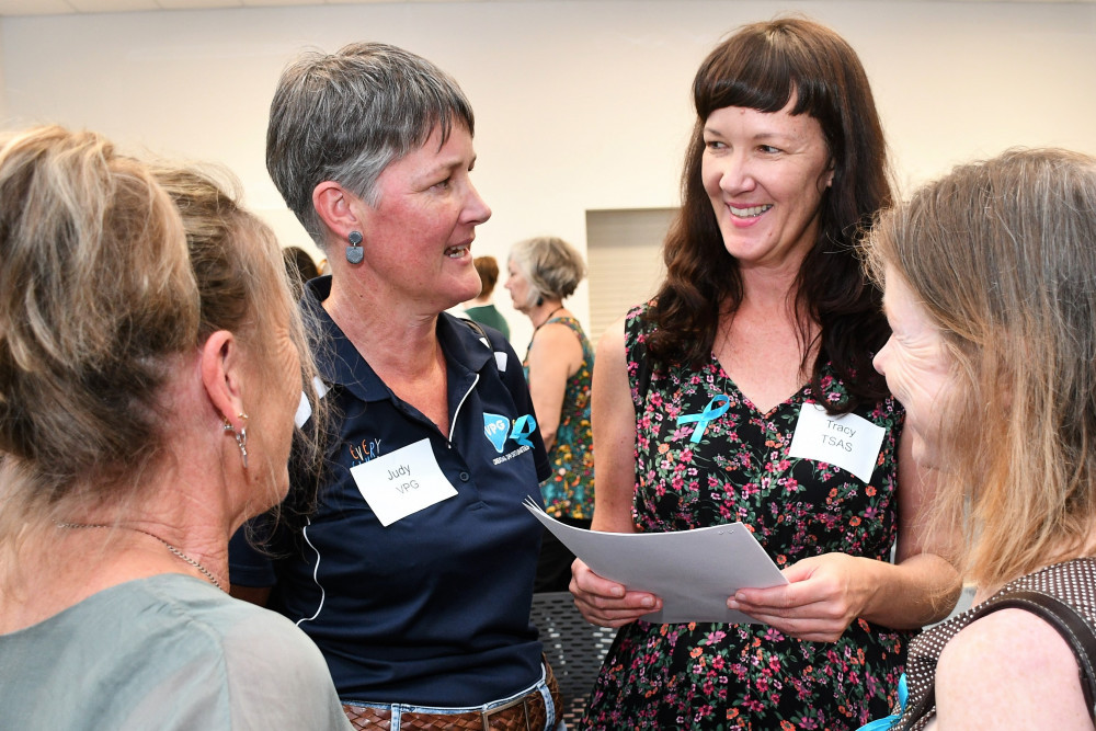 Second from right Tablelands Sexual Assault Service Manager Tracy Seawright talking with locals after their recent networking and professional development event.