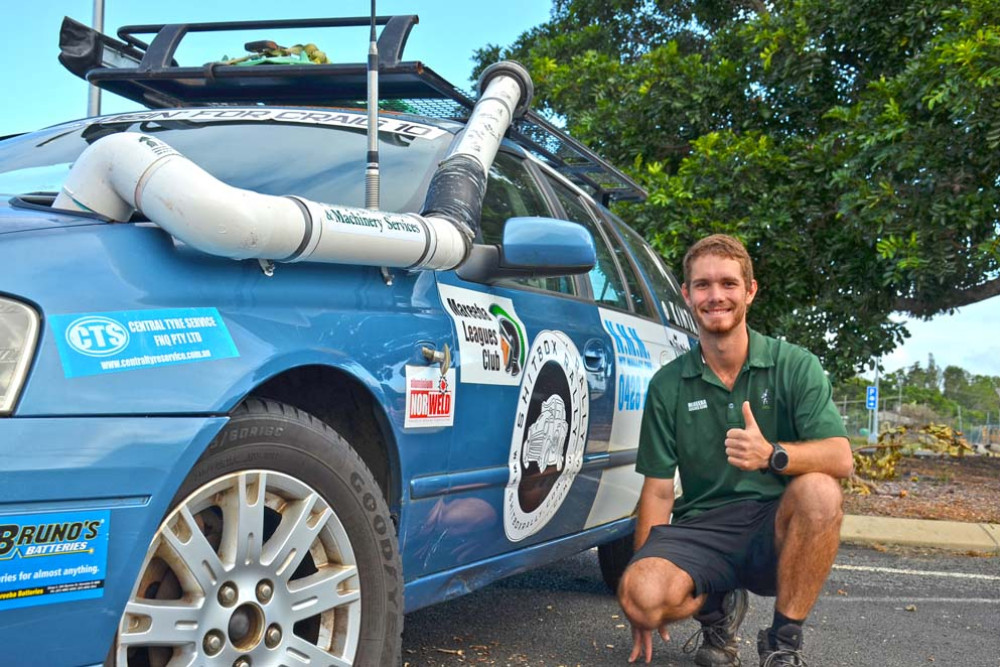 Travis Cummings with his "shitbox" car he will be taking from Melbourne to Alice Springs.