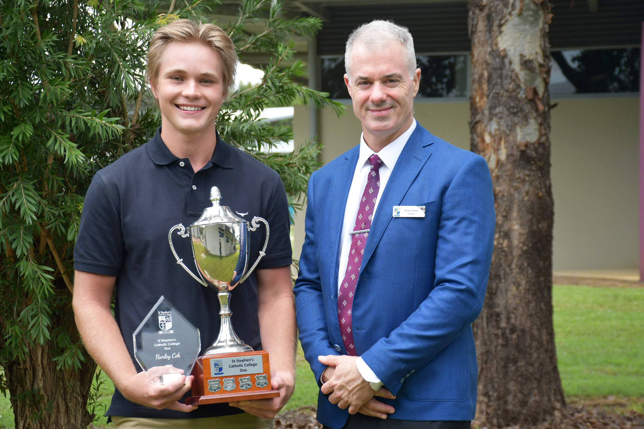 St Stephen’s Dux, Harley Cek, and principal Gary Conwell.