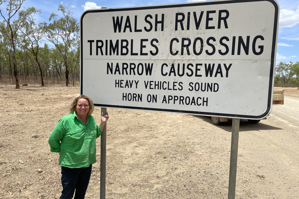 Mareeba Shire Councillor and vice-chair of the Traffic Advisory Committee, Lenore Wyatt, with the sign for Trimble’s Crossing where the new cameras will be installed