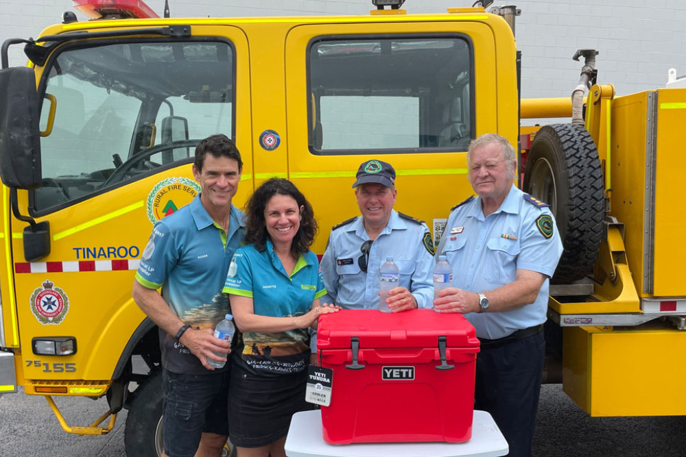Roger and Annette Wadley from Atherton Gas and Camping donated a brand-new Yeti cooler to Darryl Dilger and Les Green from Tinaroo Rural Fire Brigade ahead of fire season.
