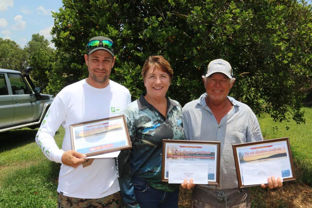 Shane Brettell and Terry Connolly received certificates and $1000 cheques from TFSS secretary Ann Leighton (centre).