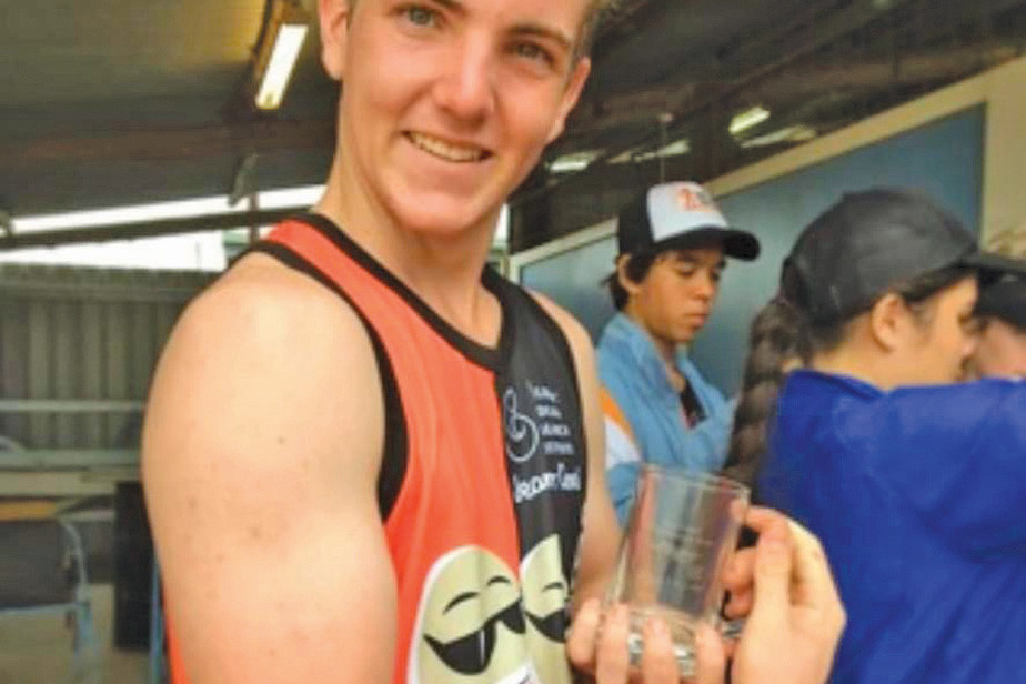 A photo of Cole Wyatt after finishing his first Great Wheelbarrow Race in 2018 with the Mareeba State High School team Scrambled Legs