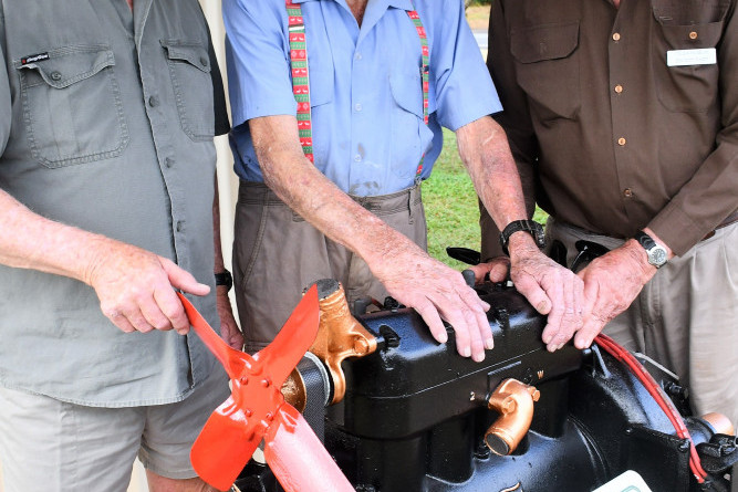 Tolga Historical Society members Wes Lay and Gordon Swan with Frank Bass (middle) who donated the engine