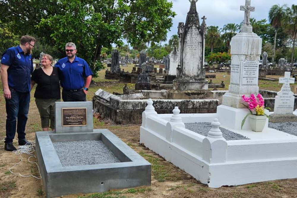 The great niece of Evan Whiting, killed in the 1918 Kuranda rail tragedy, thanks Australian Federated Union of Locomotive Employees’ state secretary Mick McKitrick (left) and president Anthony Woodward at the grave ceremony. Picture: Nick Dalton