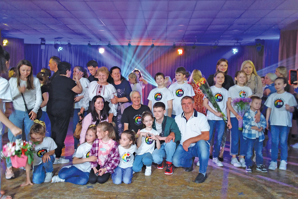 Mareeba man Tim Lovell with the Colour Music Children’s Choir in Ukraine.