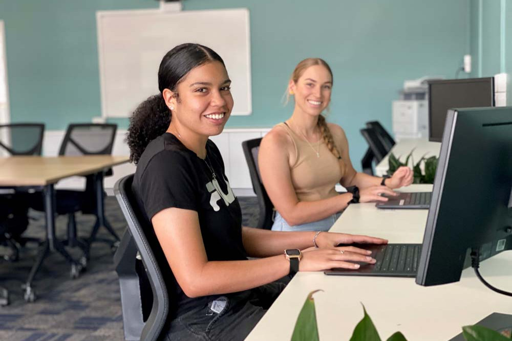 Jasmine Hyde (left) and Sophie Mohr are relishing the availability of the Tablelands University Centre to pursue their studies.