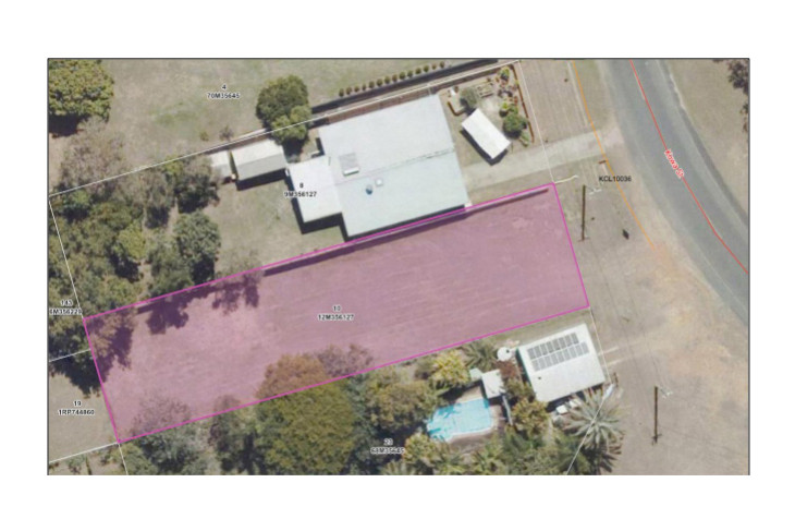 The residential block which will house three, three-bedroom units, and a draft image of the units, provided in a report to council.