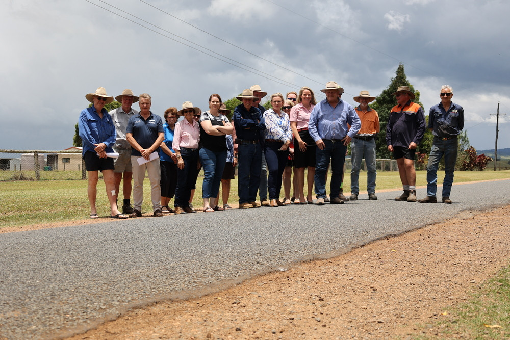 Member for Hill Shane Knuth and concerned residents, bus and truck drivers and business owners on Upper Barron Road, Upper Barron.