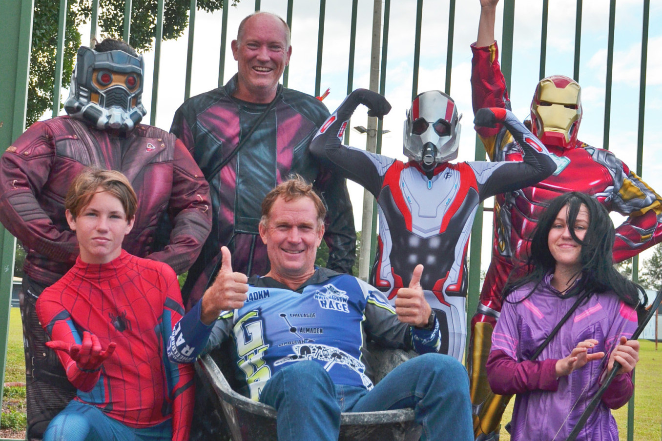 RACE READY: Superheroes from team To Chillagoe for Cole with Great Wheelbarrow Race Chair Kevin Davies who is thrilled that the 21st race will have national television coverage.
