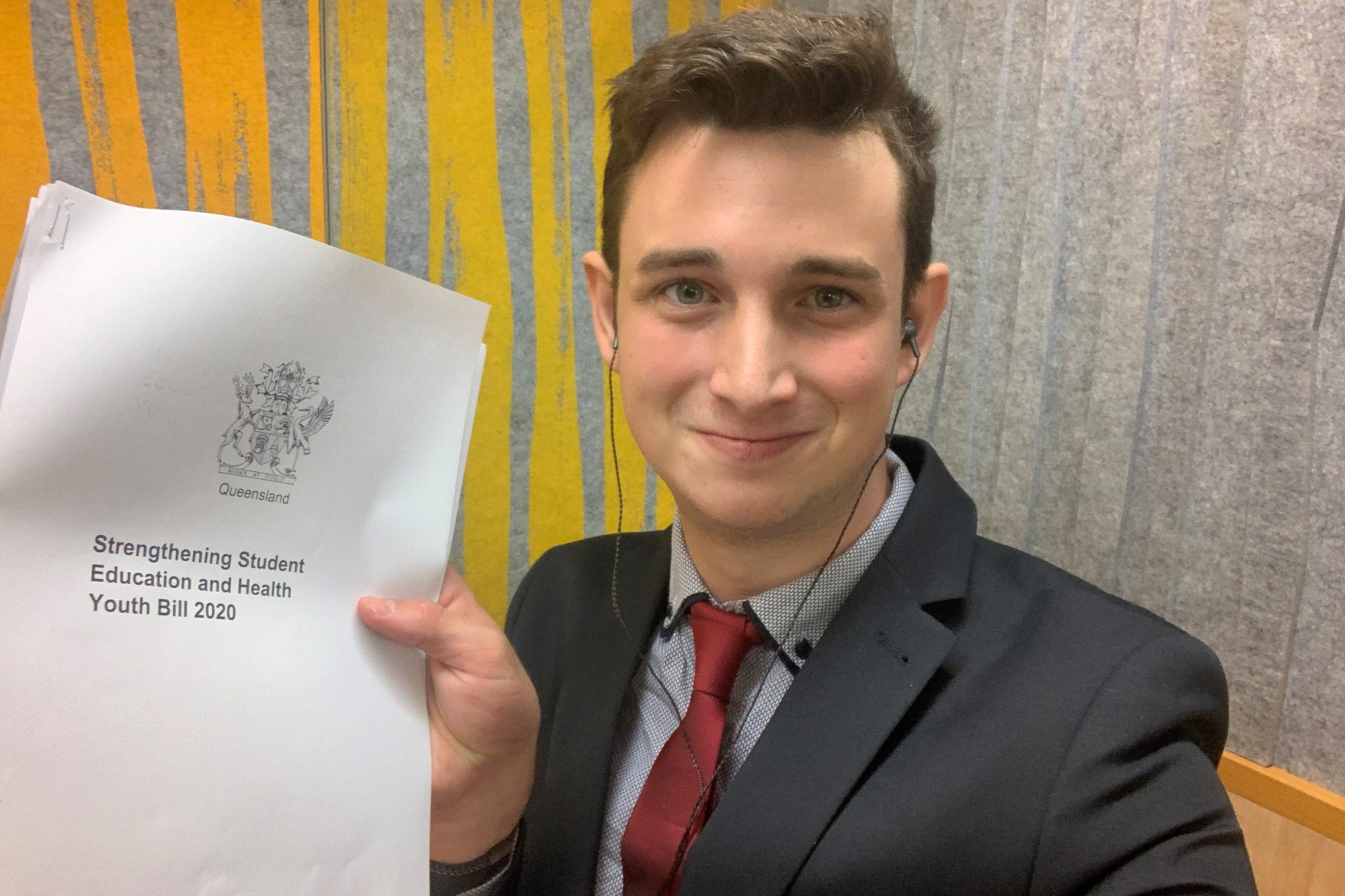 Lake Eacham local Connor Le’Gear with his committee’s bill at Youth Parliament.
