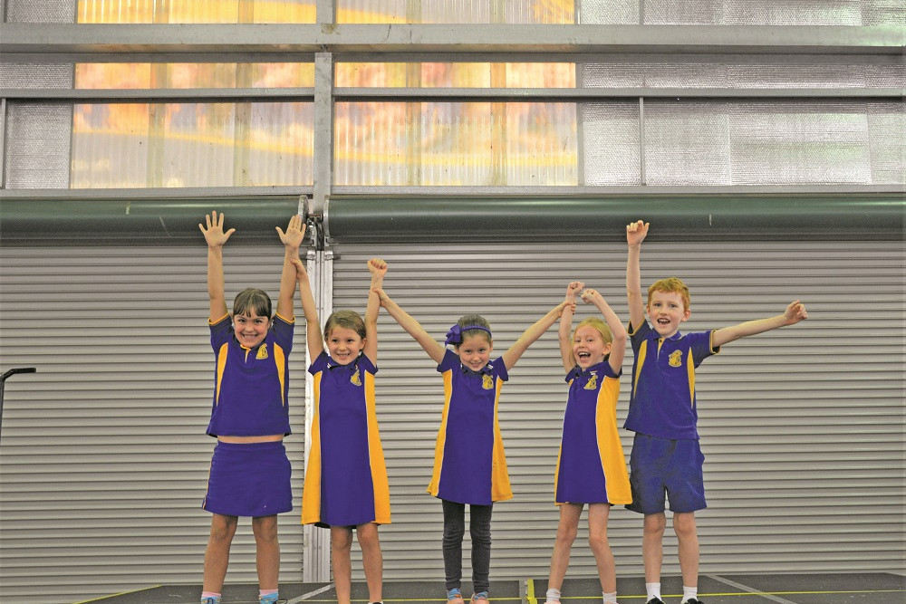 Yungaburra State School students Asher Brennan, Alex Brown, Sophia Wallace, Ella Herborn and Hugo Herborn are excited to have a brand new stage to replace their current one they are standing on, as well as a projector, screen and lights.