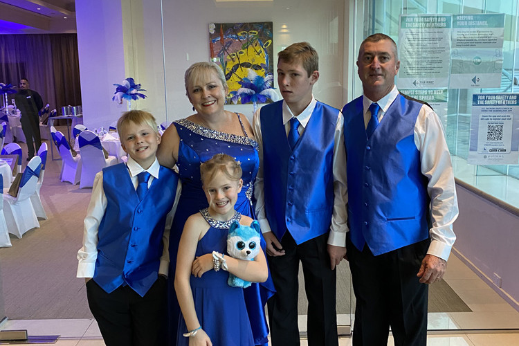 Nicola Baker and her family at last year’s Aussie Locums Blue Tie Ball which is set to take place on National Moyamoya Day this year.