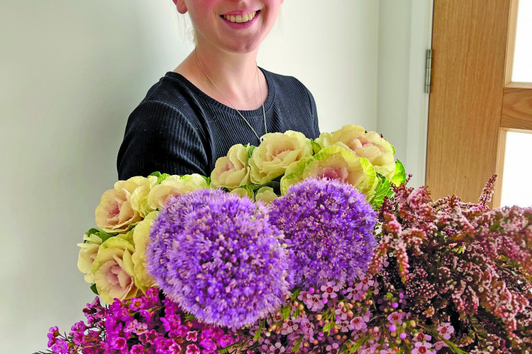 Former employee of "Floral Magic," which burned to the ground recently, 20 year old Taylor Hughes of Mareeba, launched her new online florist business "Lilah and Rose Floral Design" last Wednesday.
