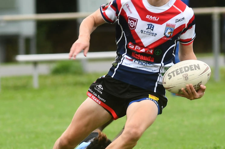 Roosters under 18 fl yer Will Simms in open space at Mossman on Saturday.