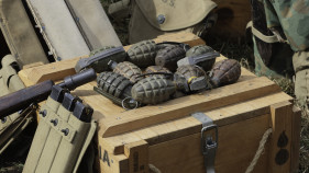 Man on hand grenade charge