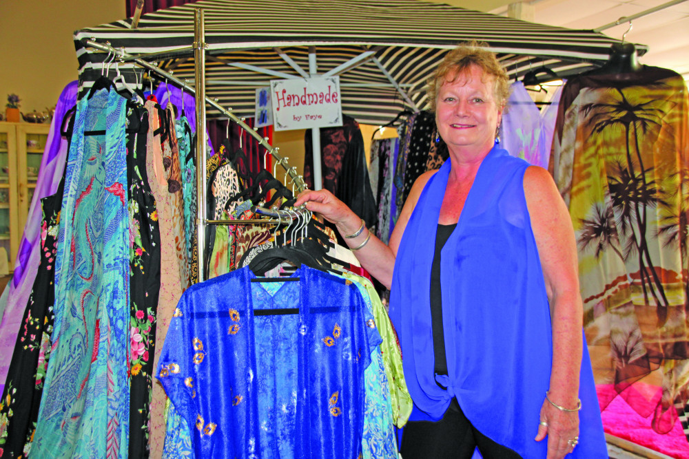 After 32 years of working at the Mt Molloy school, Faye Smith has launched her own one off resort wear line of clothing which she sells at the Port Douglas markets.