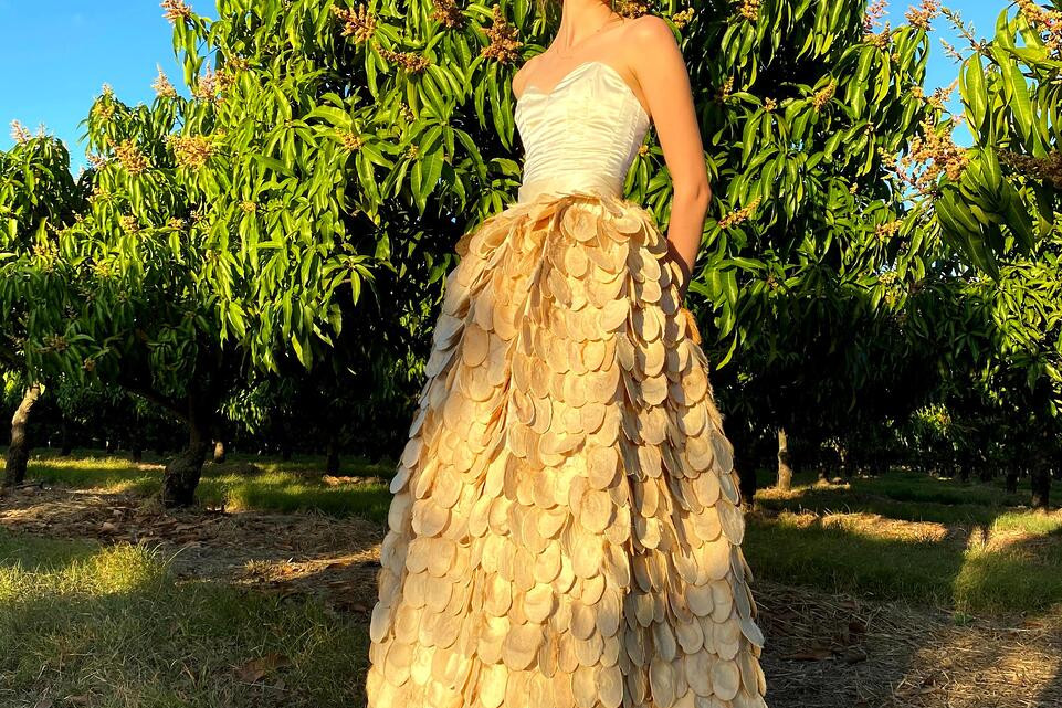 Jessica Collins from Dimbulah made this beautiful formal dress from mango seeds. Credit - Nina Whitmill.