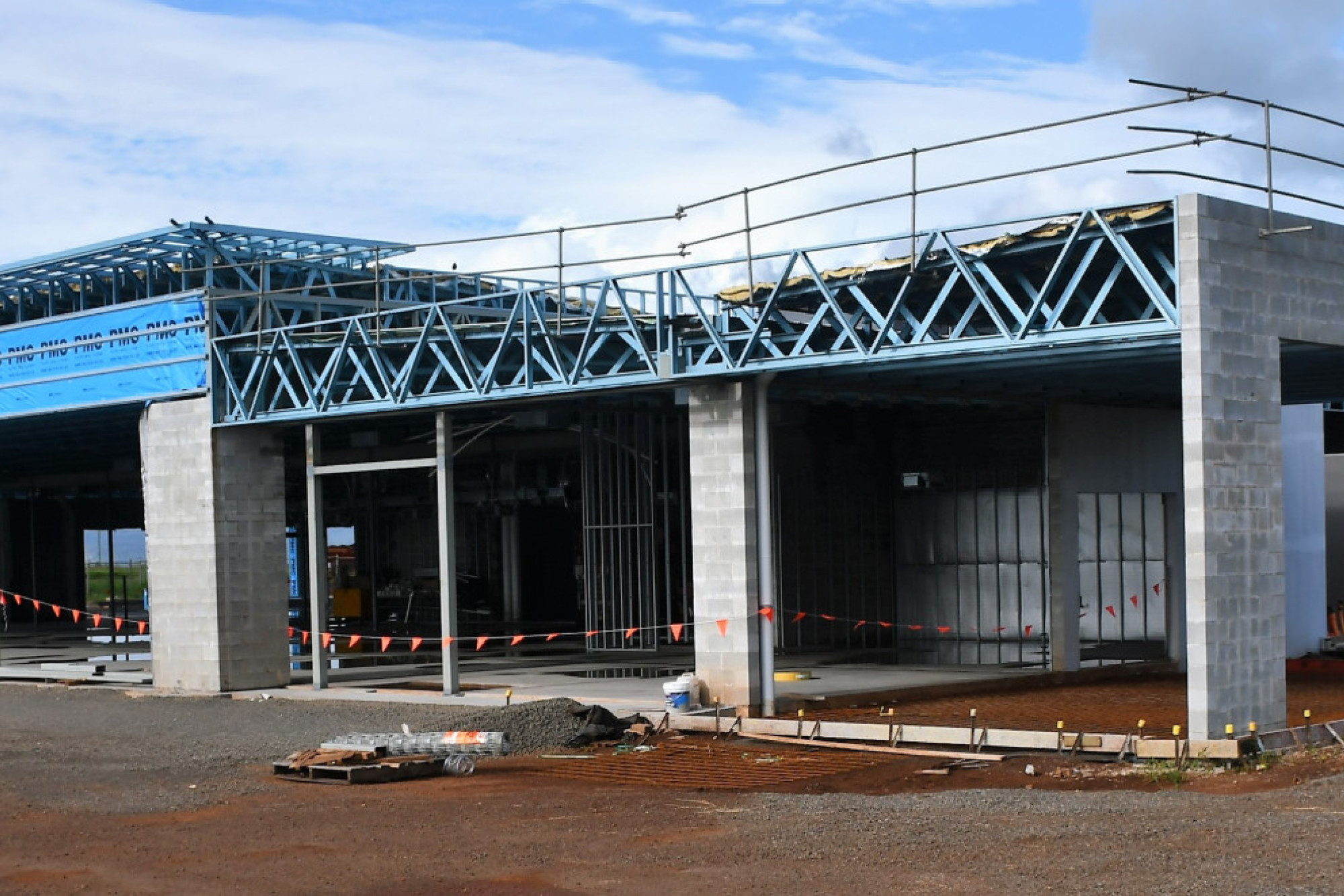 Workers on site of the new John Cole Toyota building on the Kennedy Highway in Atherton. Photo Credit - Keir Qld.