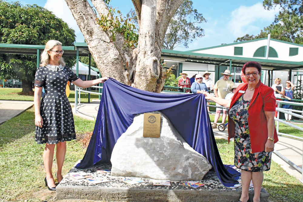 Unveiling the plaque is principal Sarah Mason and Mayor Angela Toppin.