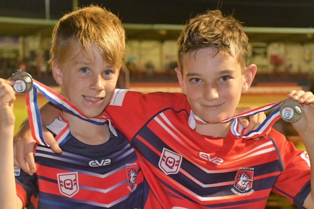 Atherton Under 10 players Logan Waters and Jack McLaren happy to have played several curtain raiser games for the Senior Roosters first grade premiership matches this year.