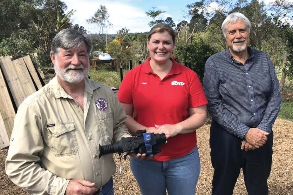 Feral Management Queensland president Greg Prior, Minister for Fire and Disaster Recovery Nicky Boyd (MP) and Shooters Union Australia president Graham Park with some of the latest thermal night vision equipment used for feral pest control.