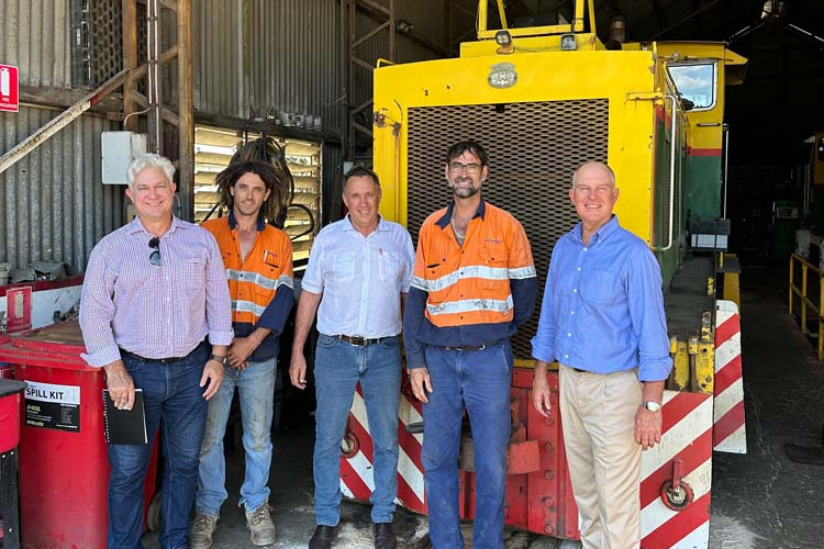 At the Mossman Mill are (from left) Graeme Bolton of the Department of Primary Industries, mill worker Clint Attenberg, Member for Cook David Kempton, mill worker Craig Butland and Primary Industries Minister Tony Perrett.