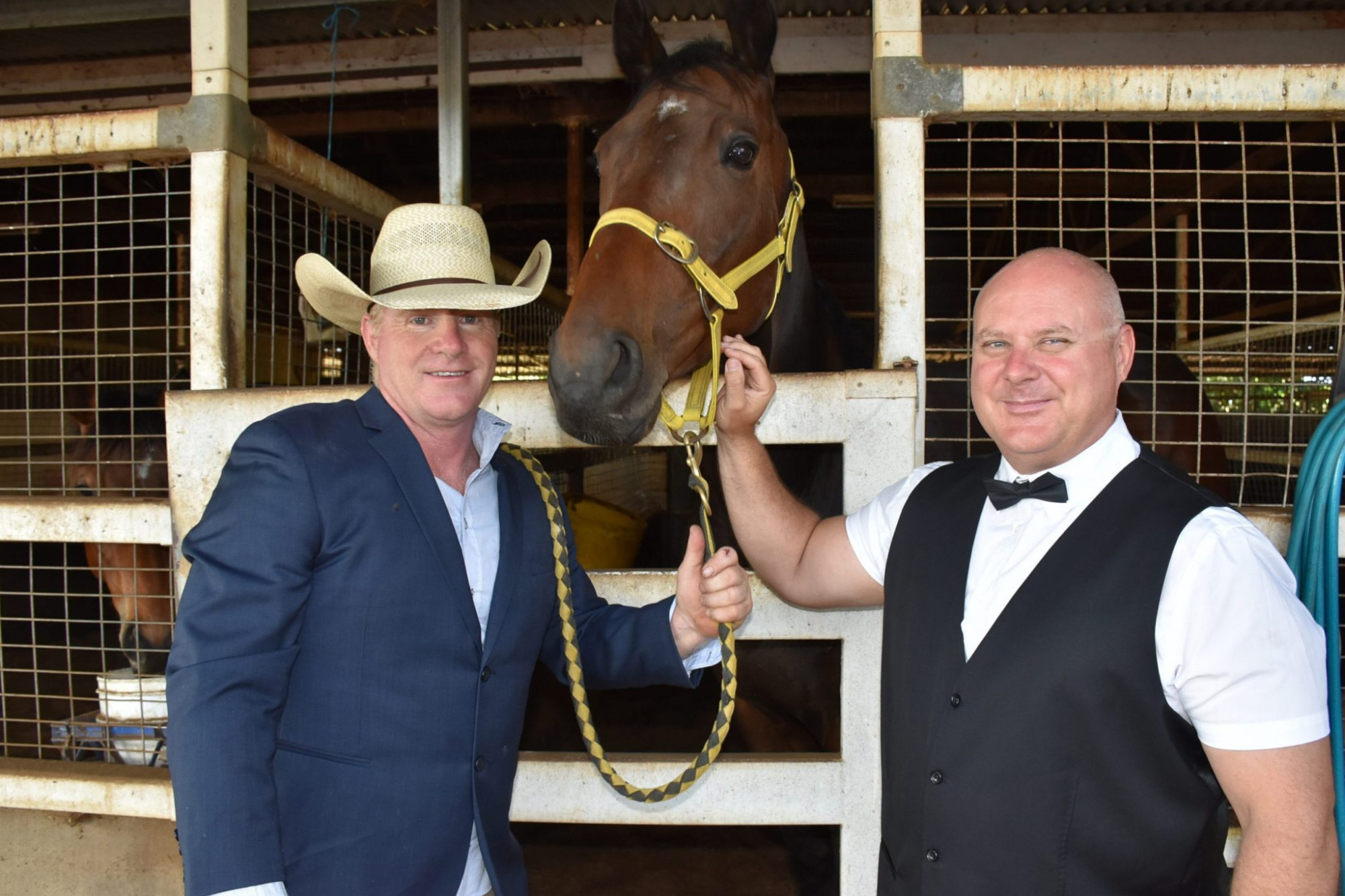 President of Mareeba Turf Club Alex Malliff, with Cairns Cup winner Paniagua and Neil Setford President of Mareeba Friends of the Hospital Foundation who are looking forward to the 2020 Melbourne Cup.