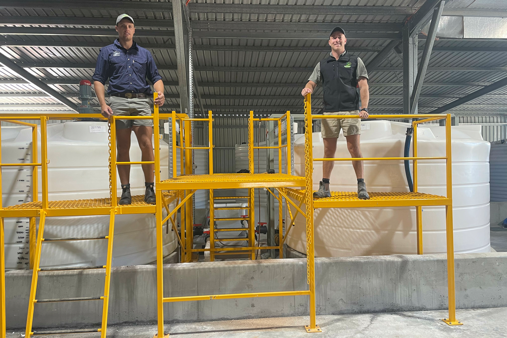 Agri Technovation agronomist Gerco Van Zyl with liquid fertiliser plant operator Morné Spies in front of one of their new fertiliser mixing tanks.