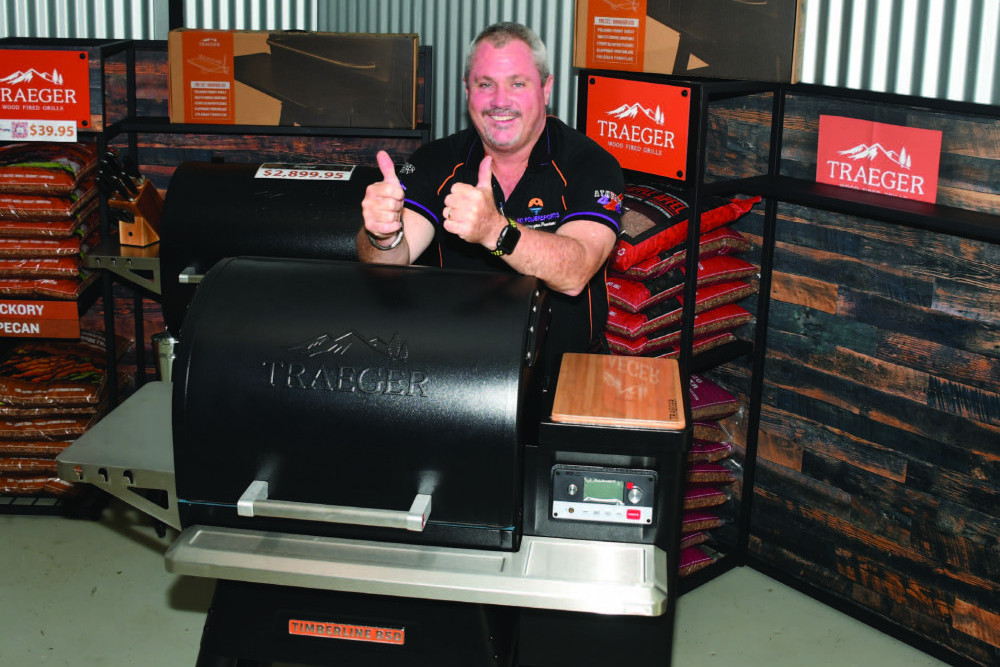 FNQ Hub owner Nik Page with the Traeger Grills now available at FNQ Hub.