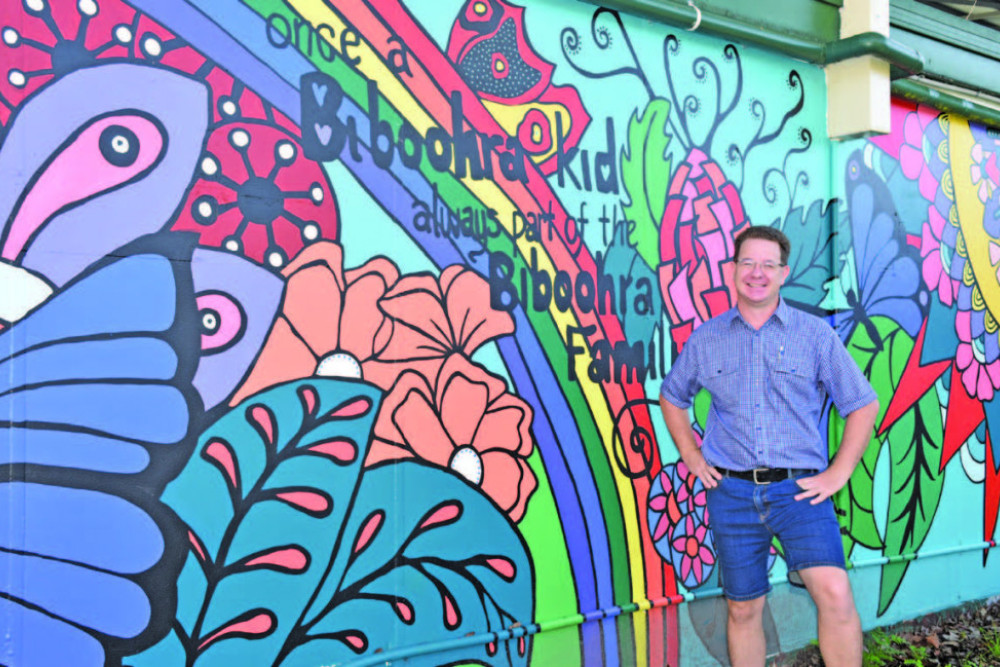 Biboohra State School principal David King in front of the new mural.