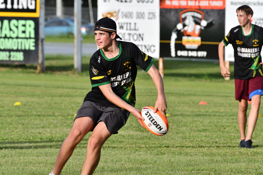 Mareeba Gladiator junior player Tyler Srhoj throwing a pass at training