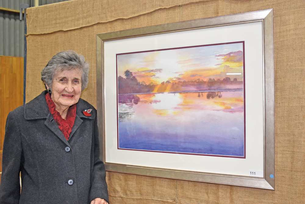 Mareeba Art Exhibition open category winner Elaine Seary with her entry Sunset Mareeba Wetlands.