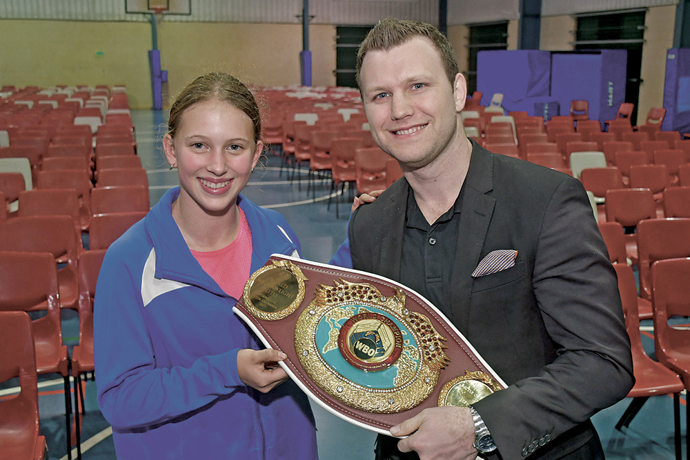 Year 8 student Indi Palmer and former Olympic boxer Jeff Horn at last week’s launch.