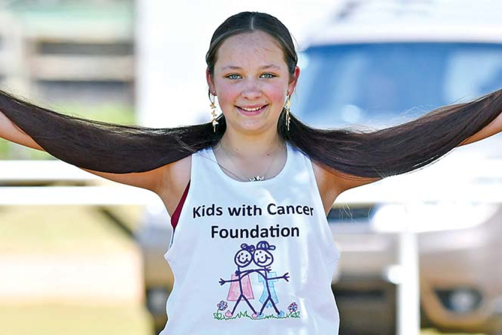 Mikayla before cutting her hair off last weekend at the Atherton Turf Club.