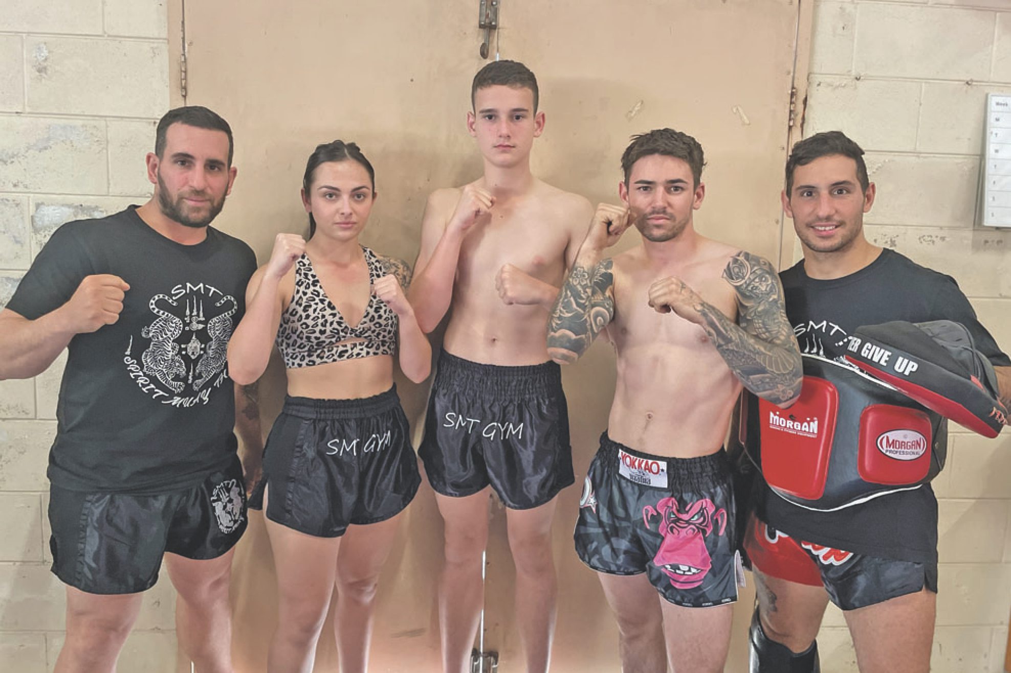 STATES BOUND: Spirit Muay Thai co-owner Rosario Signorino, fighters Shakalya Pedrola, Jye Whibberley, Anthony Raoul and co-owner Salvatore Signorino.