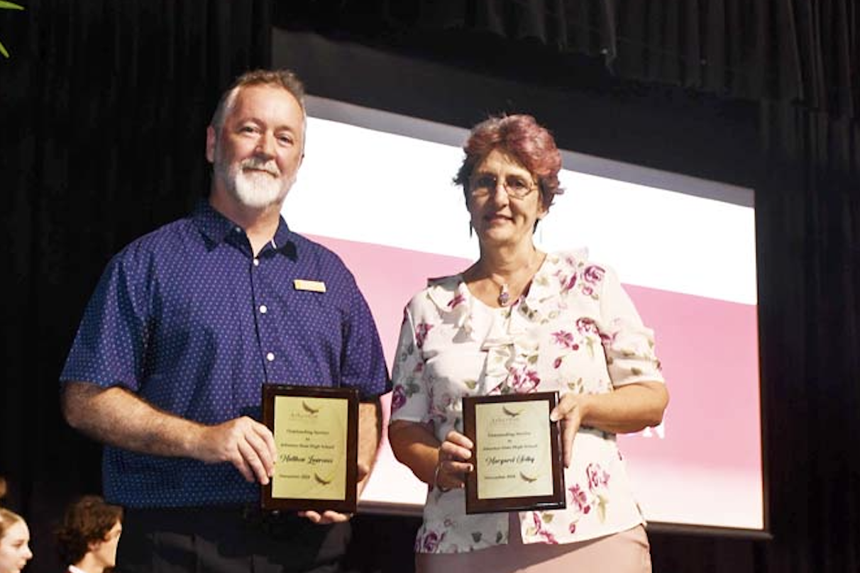 Matthew Lawrence (left) was awarded for 24 years of service at Atherton Sate High School and Margaret Selby was also awarded for 19 years of service.