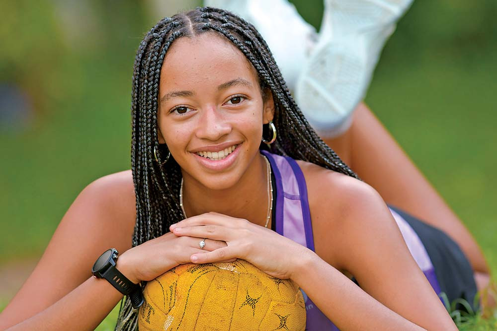 Atherton teenager Asha Simmons-Lynch has been making it big in the netball and beach volleyball scene.