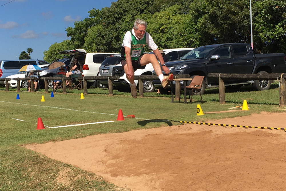 76 year-old Selwyn Hawken from Whitsundays Athletics at long jump the oldest competitor at the recent Track and Field carnival