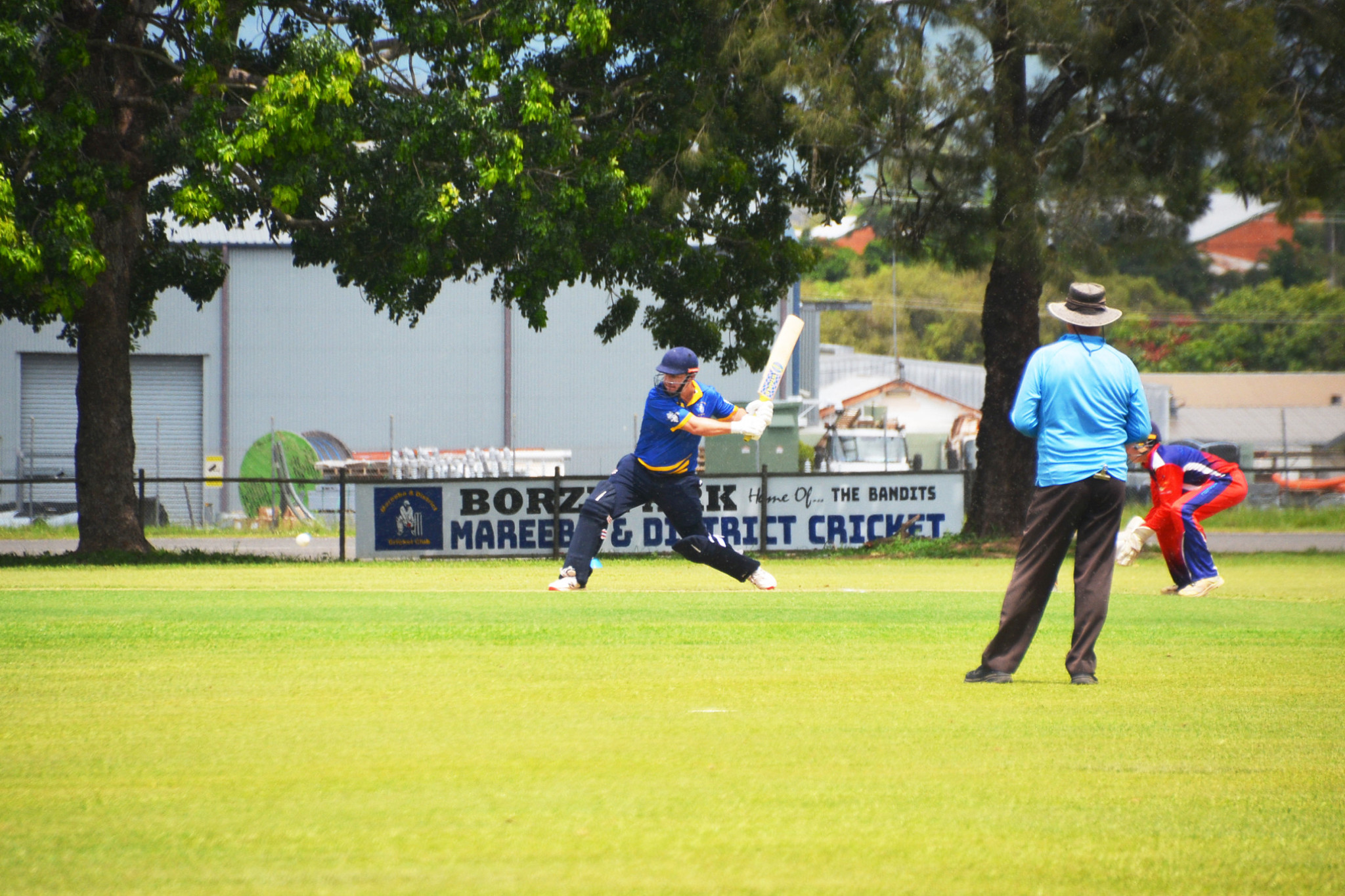 Mareeba’s Grant Hanlon winds up to hit a four.