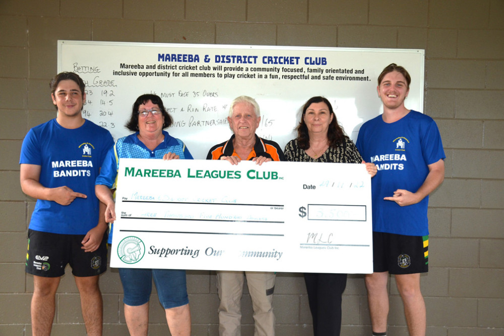 Mareeba cricket player Tristan Lopez, president Irene Roy, leagues club president David Christenson, leagues club manager Lucy Connor and player Kyle Hastie with the money that will buy them a few Frogbox