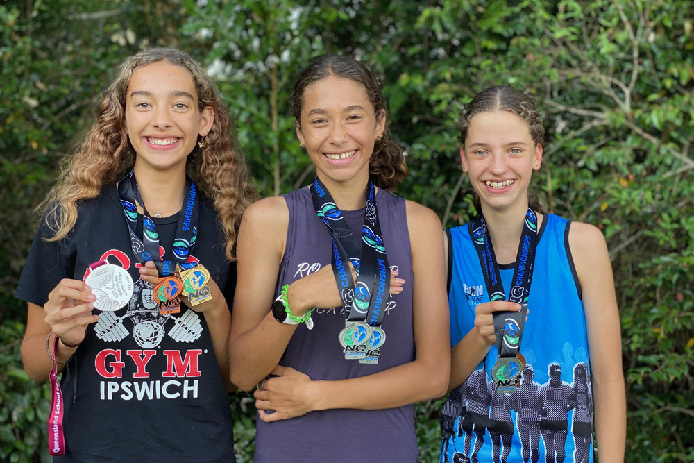 Malanda State High School students Erika Koehlman, Paige Grose and Bronte Grose are heading to South Australia next month to represent Queensland in athletics