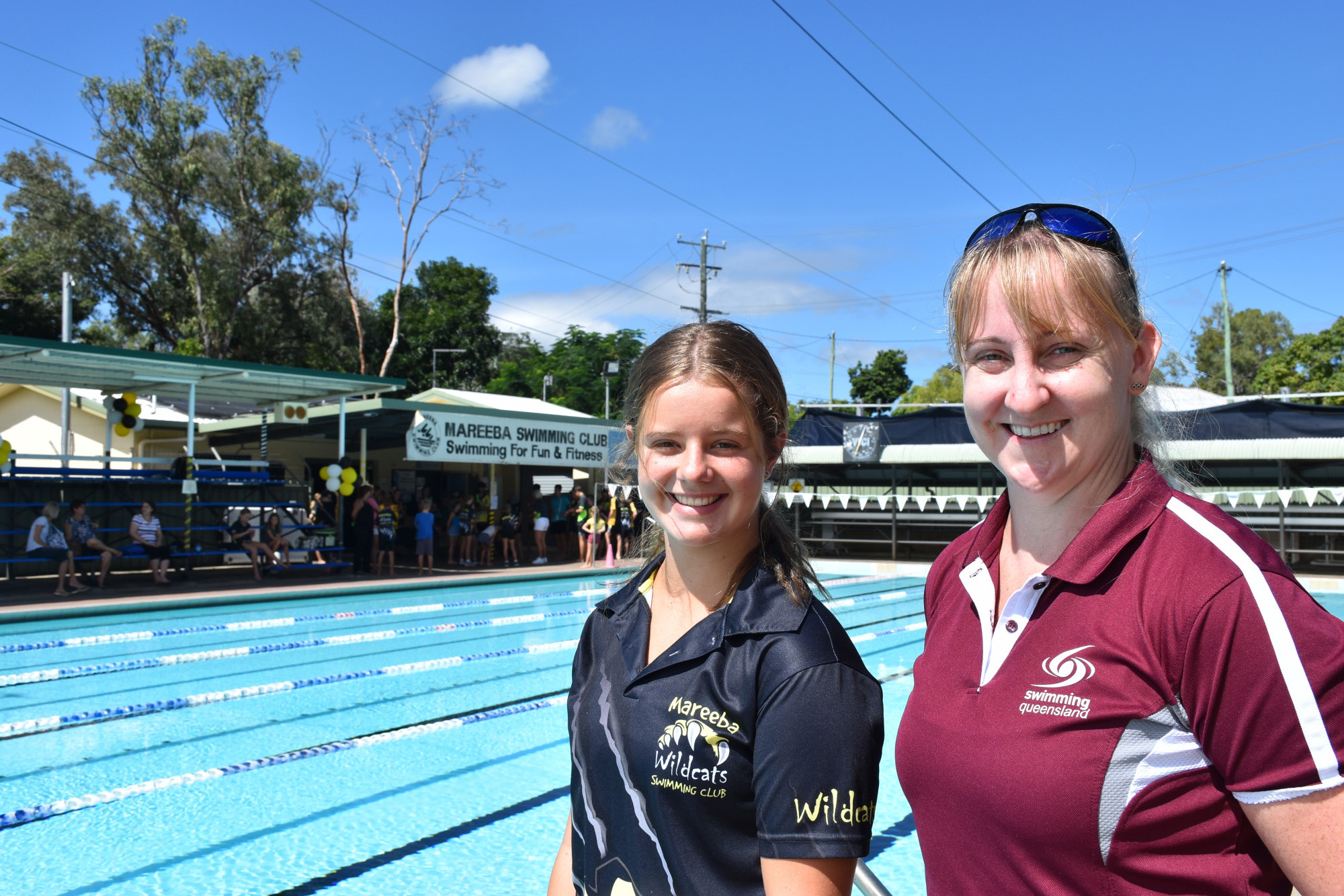 Mareeba Wildcats swimmer Zeske Elize Wilson with Olympic gold medalist Jessicah Schipper at the clinic that was held at the Mareeba Pool