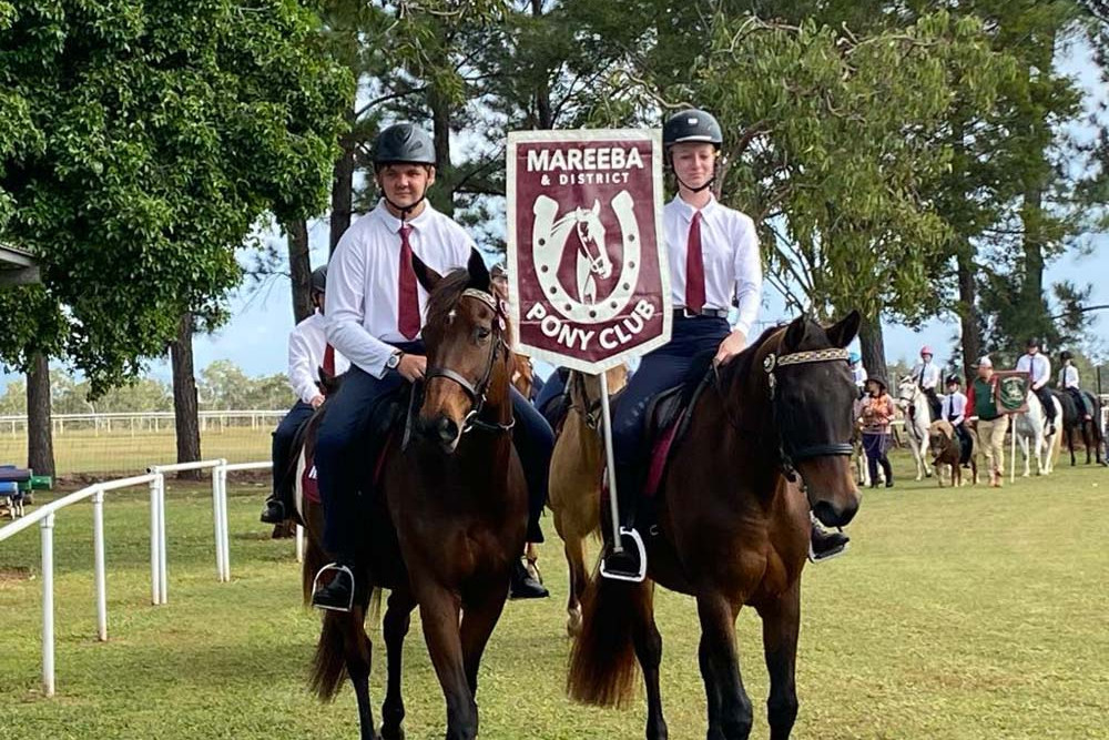 Patrick Lehmann and Samika Sheahan from Mareeba Pony Club in the march past.