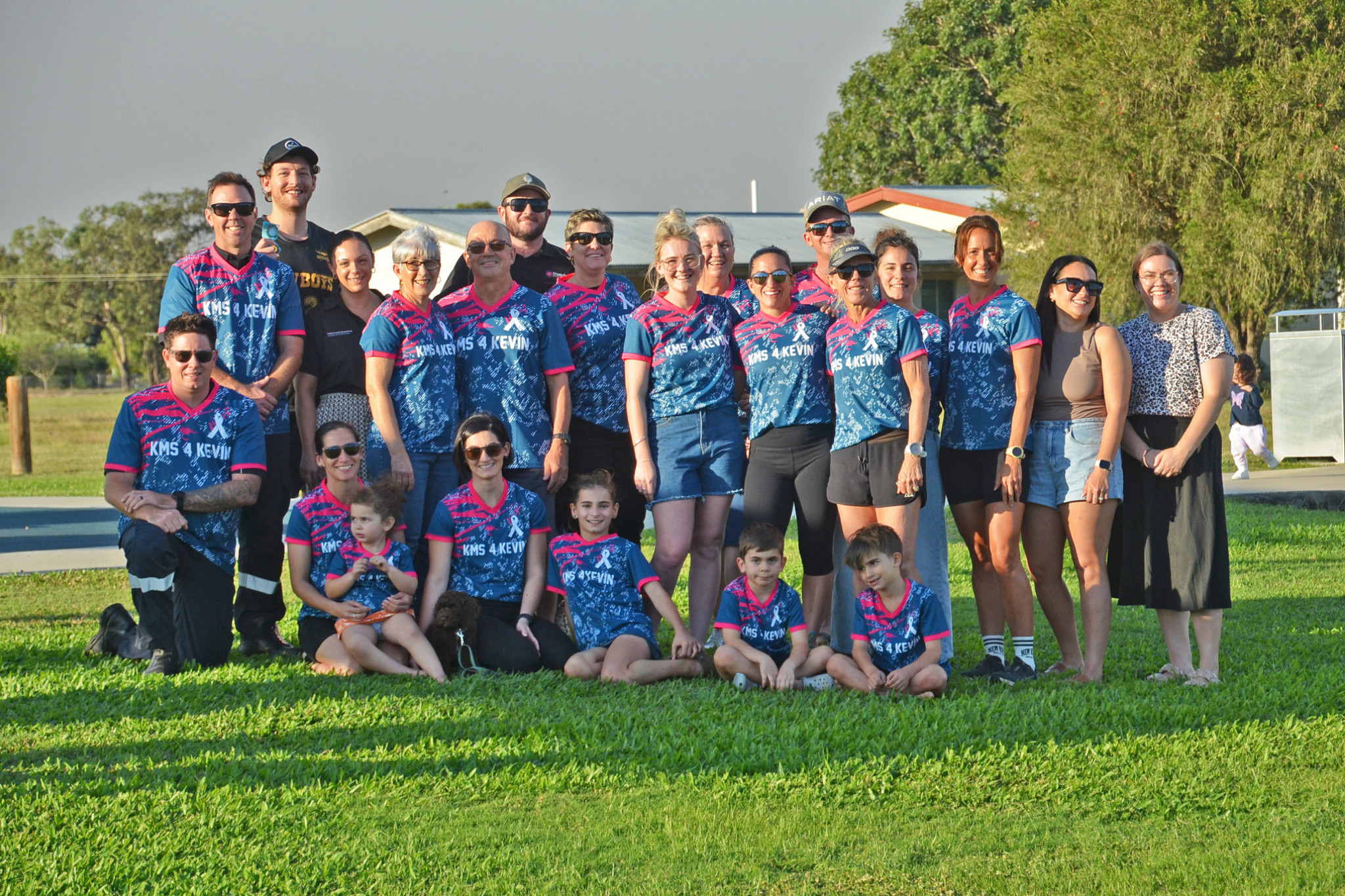 Some of the 78 locals who will be running in the Cairns Marathon to honour the late Kevin Davies.