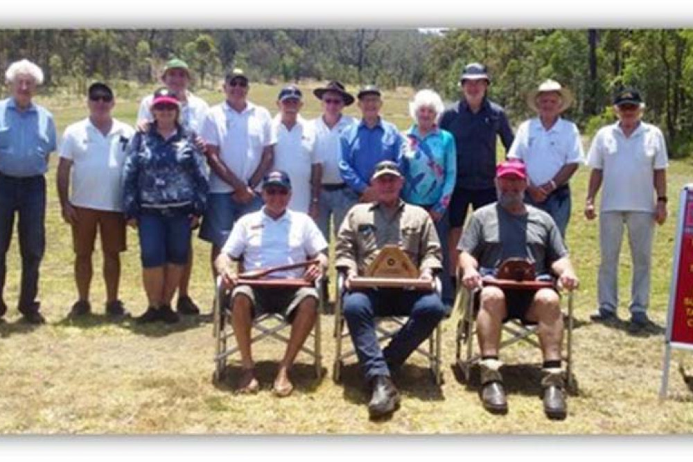 Trophy winners of the day (seated) David Grima (Encouragement Trophy), Rusty Vonarx (FNQ Nasho Marksman Trophy and Peter Campion “Friends of Nashos Trophy” with shooters on the day.