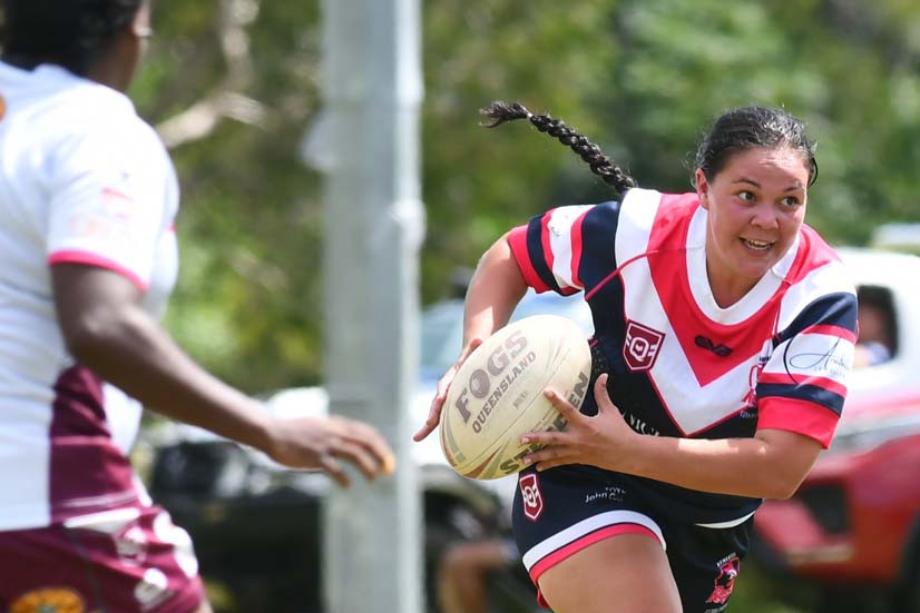Senior Roosters ladies captain Taneel Barton eyes the try line at Yarrabah on Sunday.