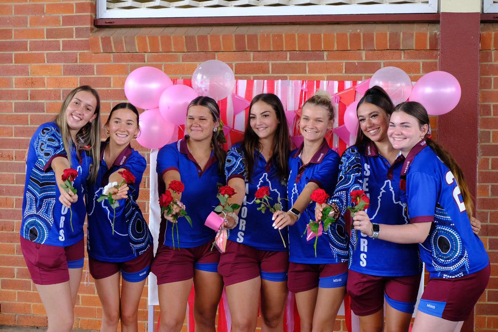 Raquel France, Amber Jerome, Mackenzie Stephens, Breanna Gambino, Bella Ford, Jashana Jackson and Kelli Scott sold roses on the day.