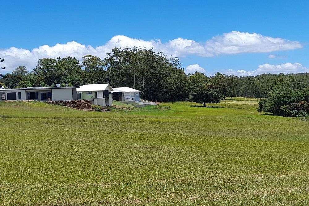 Property owners are seeking an injuction on the land behind their houses on Newland Street, Yungaburra.